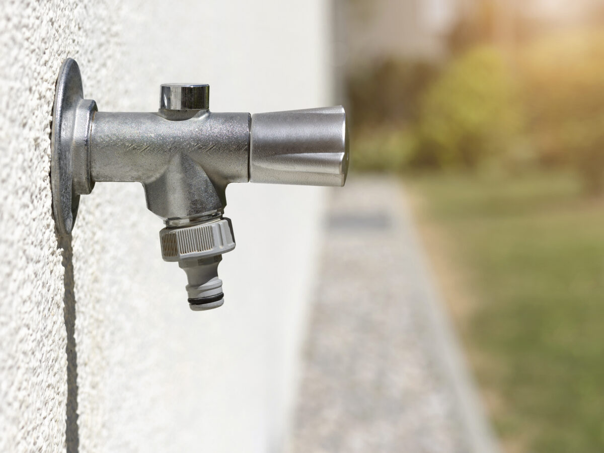 Outdoor garden tap with hose connector, the attachment point for a drip irrigation backflow preventer