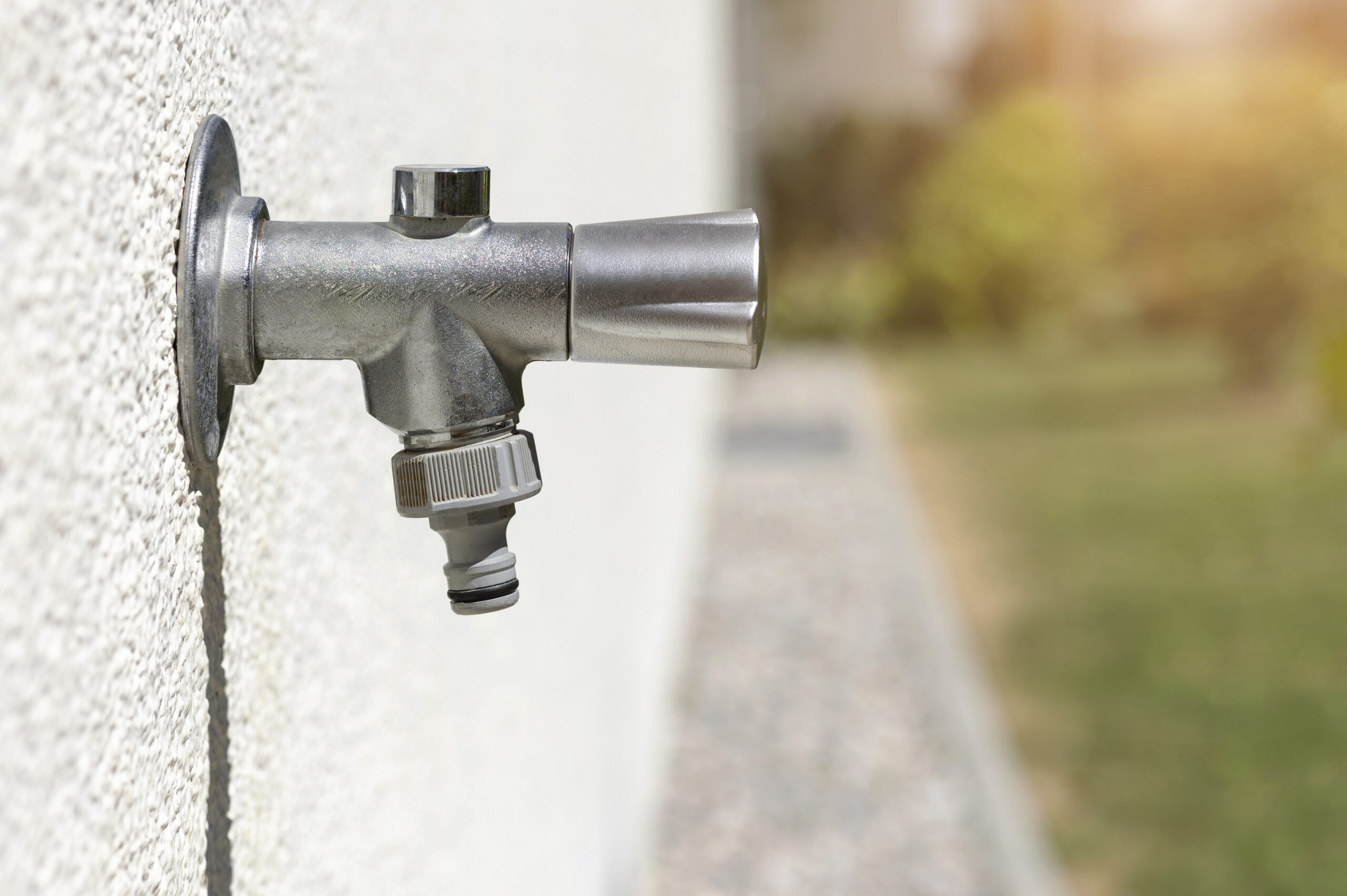 Outdoor garden tap with hose connector, the attachment point for a drip irrigation backflow preventer